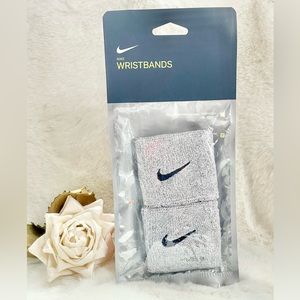 New with tag NIKE WRISTBANDS (2) ABSORBENT material•MACHINE washable Grey w/blk